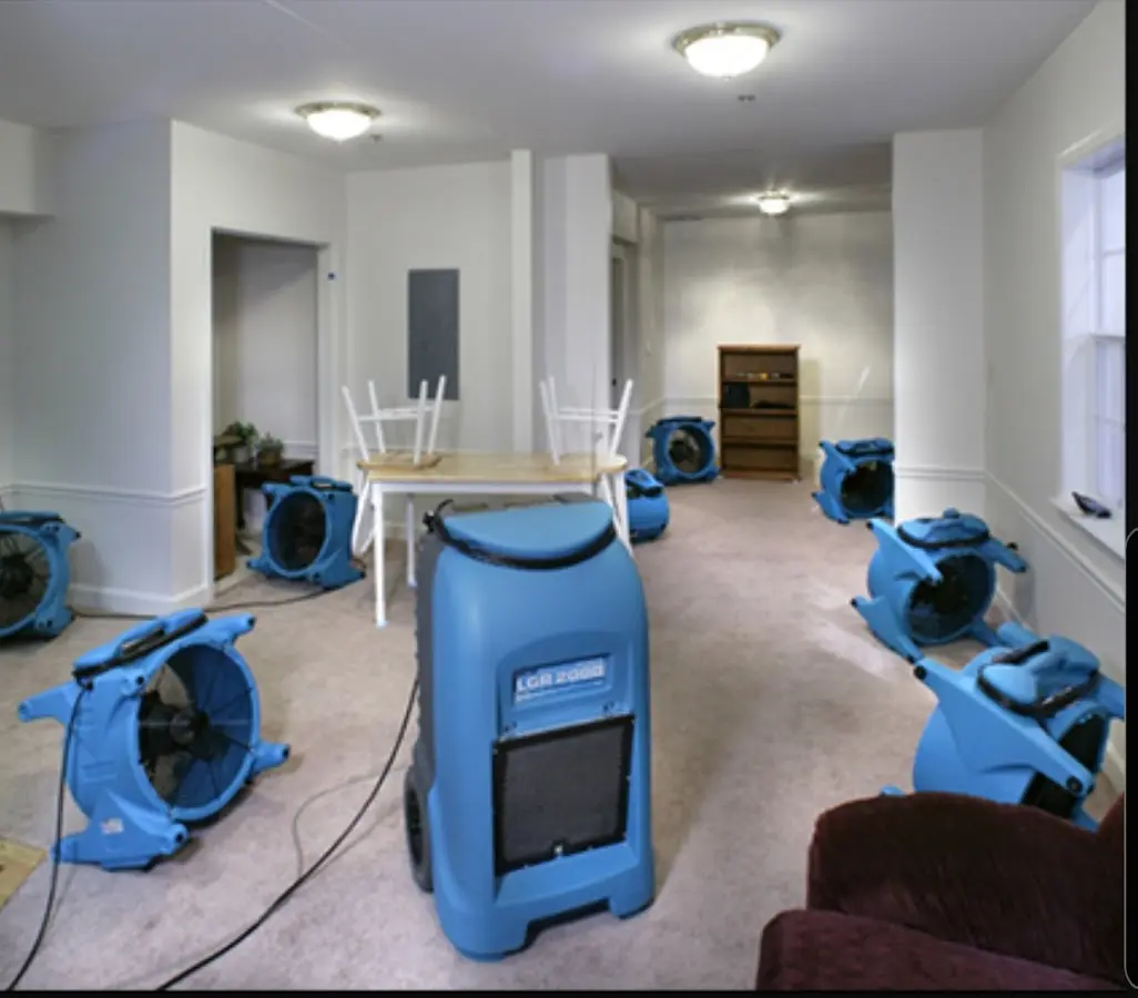 Air movers and dehumidifier setup for Water Extraction & Removal in Whitney